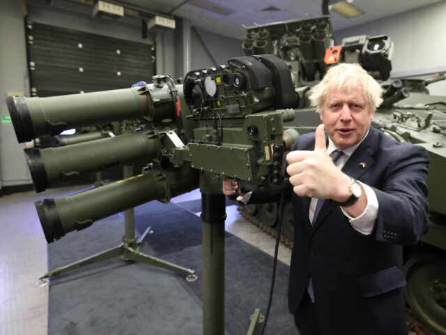 BELFAST, NORTHERN IRELAND - MAY 16: Prime Minister Boris Johnson with a Mark 3 shoulder la