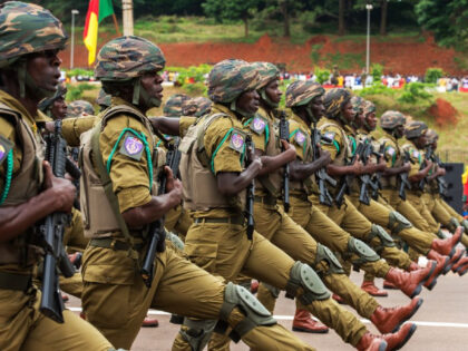Soldiers take part in a parade to celebrate the National Day in Yaounde, Cameroon, on May 20, 2022. Cameroon marked on Friday the 50th anniversary of its National Day with a military and civilian parade for the first time since the first case of coronavirus was detected in the Central …