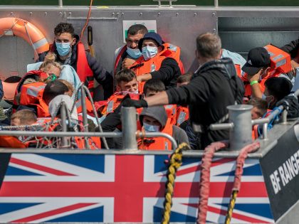 DOVER, ENGLAND - JUN 23: Border Force boat Ranger escorts 60 migrants back to dover this morning after they were picked up in the English Channel Border Force officials and the military helped the migrants ashore back at Dover Docks in Dover, England on June 23, 2022. There was two …