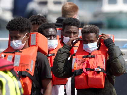 A group of people thought to be migrants are brought in to Dover, Kent, following a small boat incident in the Channel. Picture date: Tuesday June 28, 2022. (Photo by Gareth Fuller/PA Images via Getty Images)