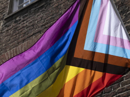 Pride Progress flag in Soho on 28th June 2022 in London, United Kingdom. The flag includes the rainbow flag stripes to represent LGBTQ+ communities, with colors from the Transgender Pride Flag and to also represent people of colour. (photo by Mike Kemp/In Pictures via Getty Images)