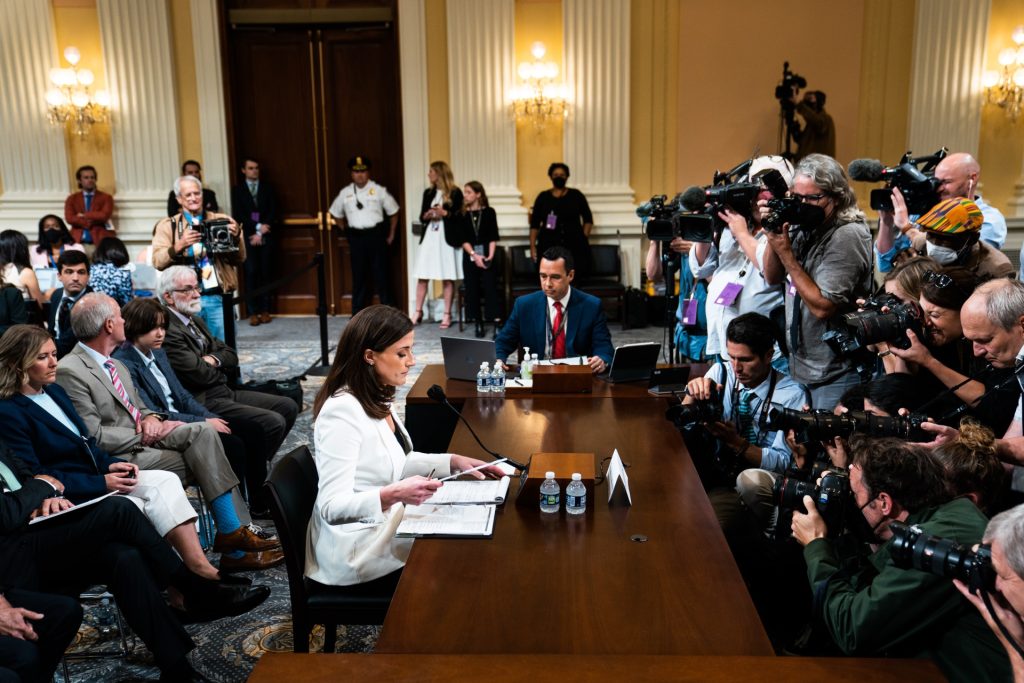 Cassidy Hutchinson, an aide to Trump White House chief of staff Mark Meadows, enters to testify as the House Jan. 6 select committee holds a hearing on Capitol Hill on Tuesday, June 28, 2022. (Demetrius Freeman/The Washington Post via Getty Images)