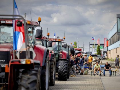 Farmers block the entrance of the distribution center of a supermarket to protest against the government's nitrogen policy in Nijkerk on July 5 2022. - - Netherlands OUT (Photo by Robin van Lonkhuijsen / ANP / AFP) / Netherlands OUT (Photo by ROBIN VAN LONKHUIJSEN/ANP/AFP via Getty Images)