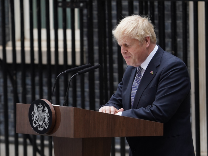 Prime Minister Boris Johnson reads a statement outside 10 Downing Street, London, formally resigning as Conservative Party leader after ministers and MPs made clear his position was untenable. He will remain as Prime Minister until a successor is in place. Picture date: Thursday July 7, 2022. (Photo by Gareth Fuller/PA …