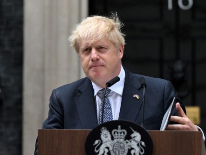 Britain's Prime Minister Boris Johnson makes a statement in front of 10 Downing Street in central London on July 7, 2022. - UK Prime Minister Boris Johnson on Thursday quit as Conservative party leader, after three tumultuous years in charge marked by Brexit, Covid and mounting scandals. (Photo by JUSTIN …