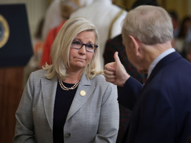 WASHINGTON, DC - JULY 7: Rep. Liz Cheney (R-WY) gets a thumbs up from former Sen. Joe Lieberman (D-CT) before the start of a Presidential Medal of Freedom ceremony in the East Room of the White House July 7, 2022 in Washington, DC. President Biden awarded the nation's highest civilian honor to 17 recipients. The award honors individuals who have made exemplary contributions to the prosperity, values, or security of the United States, world peace, or other significant societal, public or private endeavors. (Photo by Alex Wong/Getty Images)