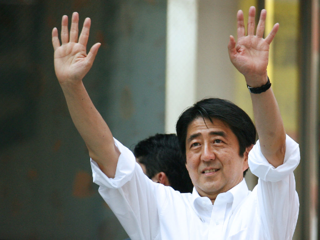 FILE: Shinzo Abe, Japan's prime minister and leader of the Liberal Democratic Party (LDP), waves as he arrives for a campaign rally for the upper house elections in Tokyo, Japan, on Saturday, July 28, 2007. Abe – Japan's longest-serving premier and a figure of enduring influence -- died after being shot at a campaign event on Friday. July 8, 2022, in an attack that shocked a nation where political violence and guns are rare. Photographer: Tomohiro Ohsumi/Bloomberg