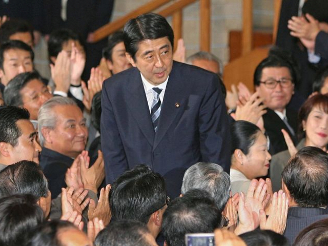 FILE: Shinzo Abe, the new president of Japan's Liberal Democratic Party, bows at the LDP headquarters in Tokyo, Japan, on Wednesday, September 20, 2006. Abe Japan's longest-serving premier and a figure of enduring influence -- died after being shot at a campaign event on Friday. July 8, 2022, in an attack that shocked a nation where political violence and guns are rare. Photographer: Kazuhiro Nogi/Pool/Bloomberg via Getty Images