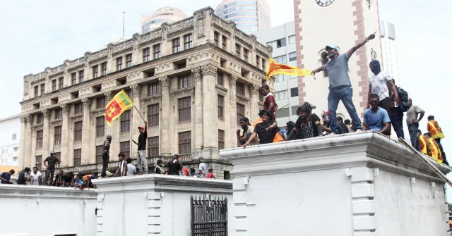 WATCH: Sri Lanka President Flees as Protesters Storm Palace