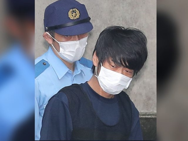 TOPSHOT - Tetsuya Yamagami (R), the man accused of murdering former Japanese Prime Ministe