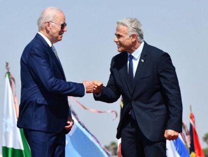 TEL AVIV, ISRAEL - JULY 13: (----EDITORIAL USE ONLY â MANDATORY CREDIT - "ISRAELI GOVERNMENT PRESS OFFICE (GPO) / HANDOUT" - NO MARKETING NO ADVERTISING CAMPAIGNS - DISTRIBUTED AS A SERVICE TO CLIENTS----) U.S President Joe Biden (L) is welcomed by Israeli President Isaac Herzog (not seen) and Israeli Prime …