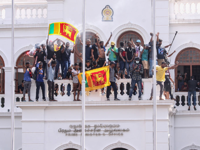 SRI LANKA - 2022/07/13: Thousands of anti-government protesters stormed into Sri Lanka's Prime Minister Ranil Wickremesinghe's office hours after he was named as acting President. (Photo by Amitha Thennakoon/Pacific Press/LightRocket via Getty Images)