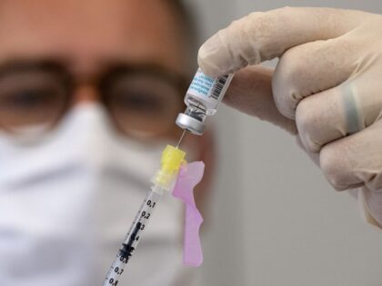 14 July 2022, Bavaria, Munich: An employee prepares a syringe with Bavarian Nordic's vaccine (Imvanex / Jynneos) against monkeypox at Klinikum rechts der Isar. Photo: Sven Hoppe/dpa (Photo by Sven Hoppe/picture alliance via Getty Images)