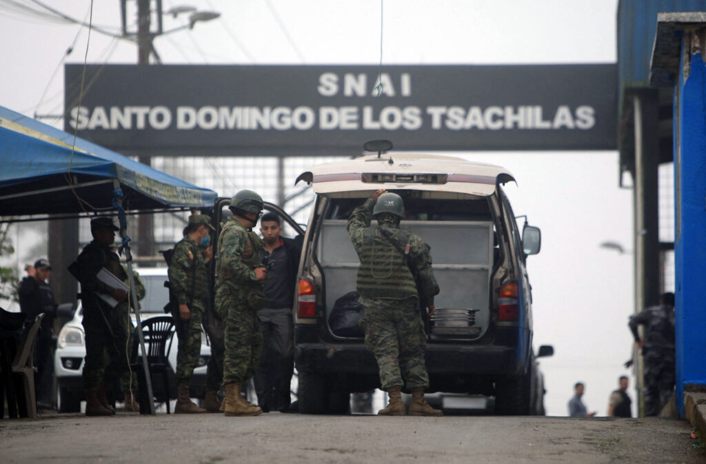 Security forces are seen outside the Bellavista prison, in the town of Santo Domingo de los Colorados, about 80 km from Quito, a day after 13 inmates were killed and two injured in a bloody fight between prisoners, on July 19, 2022. - Thirteen inmates were killed and two others injured on Monday in yet another bloody fight in a notorious Ecuadoran prison, law enforcement officials said. Prison officials, aided by the military and the police, were able to regain control of the facility, prison authority SNAI said. The incident took place at the same prison where 44 inmates were killed in a bloody brawl in May. (Photo by Juan Carlos Perez / AFP) (Photo by JUAN CARLOS PEREZ/AFP via Getty Images)