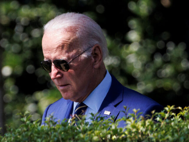 U.S. President Joe Biden walks on the South Lawn to board Marine One at the White House in
