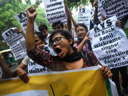 Student activists of Krantikari Yuva Sangathan (KYS) shout slogans outside the United Nati