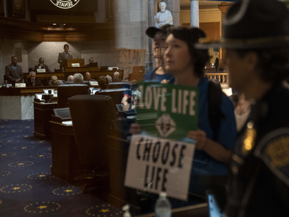 Anti-abortion demonstrators protest outside the chamber during a special session of the In