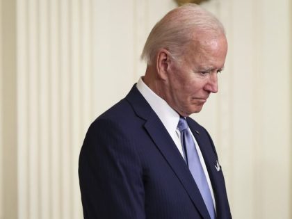 WASHINGTON, DC - JULY 05: U.S. President Joe Biden bows his head in prayer before presenti