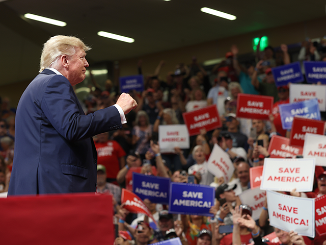 Former U.S. President Donald Trump greets supporters during a "Save America" rally at Alaska Airlines Center on July 09, 2022 in Anchorage, Alaska. Former President Donald Trump held a "Save America" rally in Anchorage where he campaigned with U.S. House candidate former Alaska Gov. Sarah Palin and U.S. Senate candidate Kelly Tshibaka. (Photo by Justin Sullivan/Getty Images)