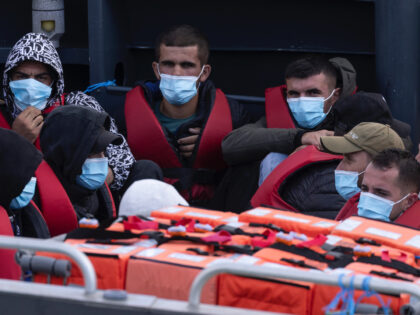 DOVER, ENGLAND - JULY 15: Migrants are brought into the port of Dover after being intercep