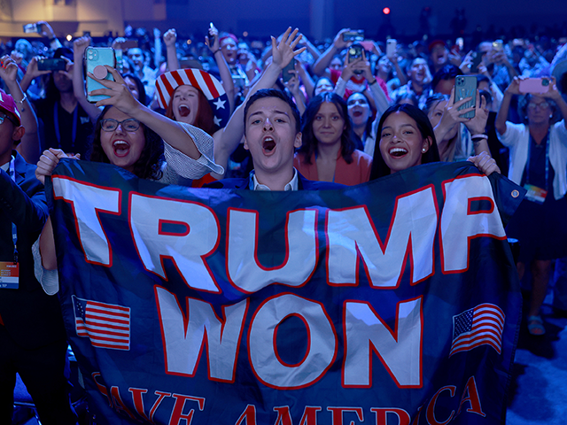 TAMPA, FLORIDA - JULY 23: People cheer as former U.S. President Donald Trump arrives on stage during the Turning Point USA Student Action Summit held at the Tampa Convention Center on July 23, 2022 in Tampa, Florida. The event features student activism, leadership training, and a chance to participate in …