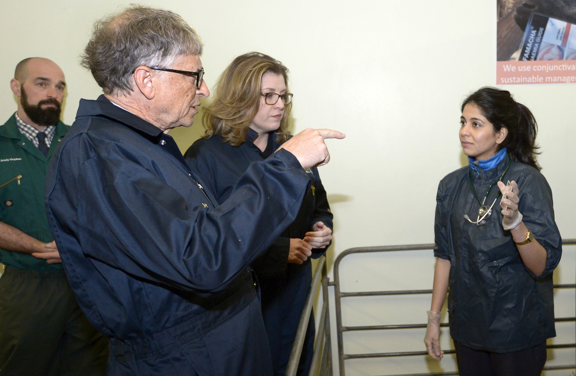 US entrepeneur and co-founder of the Microsoft Corporation, Bill Gates (2L) and Britain's International Development Secretary Penny Mordaunt (3L) meet vet Andy Hopker (L) and student Vanya Lalljee during an event to launch the Global Academy of Agriculture and Food Security at the University of Edinburgh, Scotland on January 26, 2018. / AFP PHOTO / POOL / Neil Hanna (Photo credit should read NEIL HANNA/AFP via Getty Images)