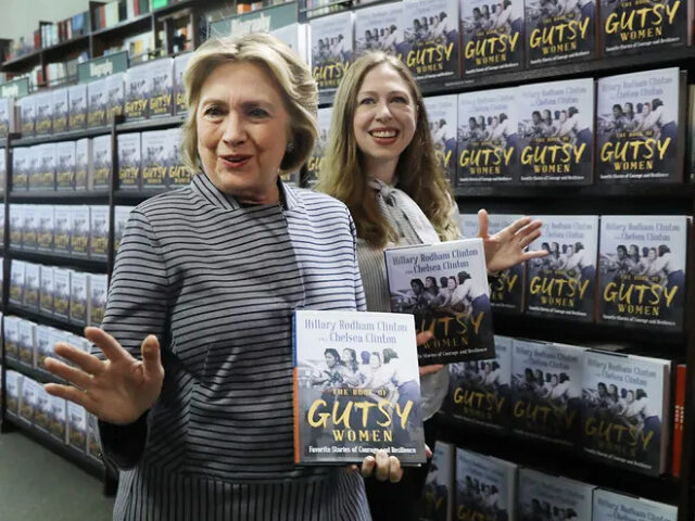 NEW YORK, NEW YORK - OCTOBER 03: Chelsea and Hillary Clinton pose with their new book &quo