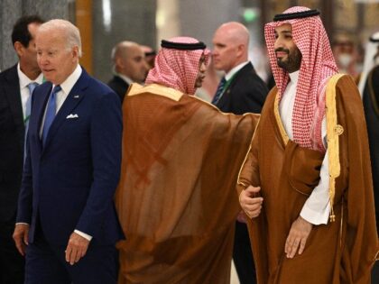 US President Joe Biden (L) and Saudi Crown Prince Mohammed bin Salman (R) arrive for the family photo during the Jeddah Security and Development Summit (GCC+3) at a hotel in Saudi Arabia's Red Sea coastal city of Jeddah on July 16, 2022. (Photo by MANDEL NGAN / POOL / AFP) …