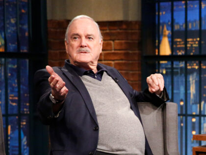 LATE NIGHT WITH SETH MEYERS -- Episode 197 -- Pictured: (l-r) Actor John Cleese during an interview with host Seth Meyers on April 28, 2015 -- (Photo by: Lloyd Bishop/NBC/NBCU Photo Bank)