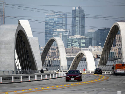 Los Angeles, CA - July 27:Cool design and city views are big draws to the new 6th street bridge in Los Angeles, CA Wednesday, July 27, 2022. The LAPD has put more enforcement on the bridge to help cut down on street take-overs, tagging, cruising and other problems since the …