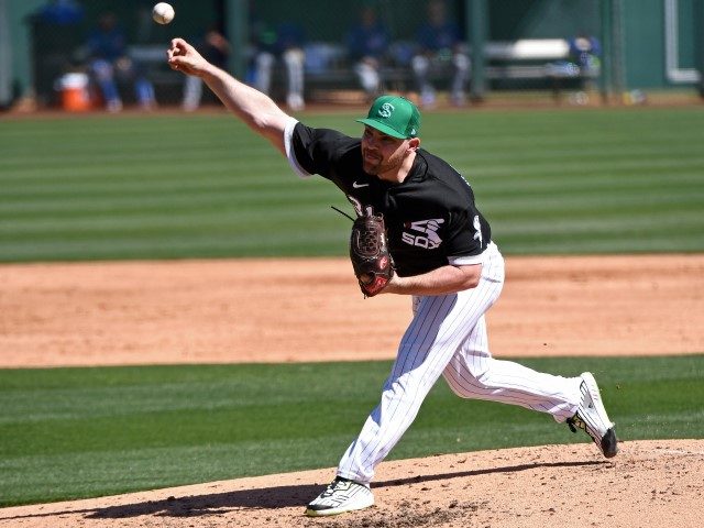 Liam Hendricks, #31 of the Chicago White Sox, throws a pitch during the third inning of an