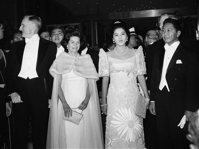 First Lady Lady Bird Johnson, second from left, Pres. Lyndon Johnson, left, and Mrs. Imelda Marcos, wife of the President of the Philippines, Ferdinand Marcos, right, arrive at Lincoln Center for the opening performance at the Metropolitan Opera House, Sept. 16, 1966, New York. They saw the world premiere of composer Samuel Barbers Antony and Cleopatra. (AP Photo)