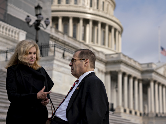 Representative Jerry Nadler, a Democrat from New York and chairman of the House Judiciary Committee, right, talks to Representative Carolyn Maloney, a Democrat from New York, after a moment of silence outside the U.S. Capitol in Washington, D.C., U.S., on Wednesday, Sept. 11, 2019. U.S. House Speaker Nancy Pelosi and …