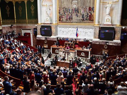 French Prime Minister Elisabeth Borne addresses MPs during her "general political declaration" to kick off the legislative session at The National Assembly in Paris on July 6, 2022. - Borne, 61, lays out the government's policy priorities in her first speech in front of what promises to be a stormy …