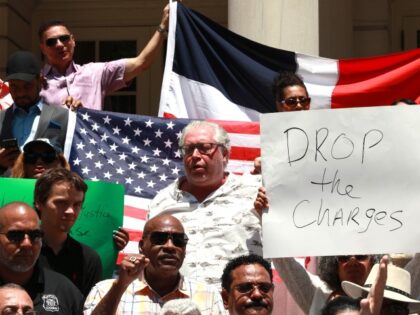 July 13: Members of the Dominican Republic Community, Bodega owners and different associations are pictured on the steps of City Hall during press conference asking Manhattan D. A. Alvin Bragg to drop charges against bodega worker Jose Alba accused of killing a robber during a fight at a bodega where …