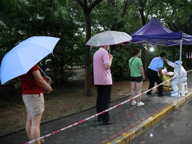 XI'AN, CHINA - JULY 5, 2022 - Residents of a community undergo nucleic acid testing i