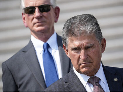 WASHINGTON, DC - SEPTEMBER 13: (L-R) Sen. Tommy Tuberville (R-AL) and Sen. Joe Manchin (D-WV) attend a remembrance ceremony marking the 20th anniversary of the 9/11 terror attacks on the steps of the U.S. Capitol, on September 13, 2021 in Washington, DC. The Senate is back in session this week …