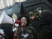 Akron Business Owners Rise Early to Clean Damage from Violent Protest