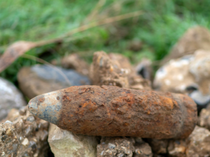 ALBERT, FRANCE - NOVEMBER 09: An artillery shell is placed at the side of a field after being ploughed up by a farmer near Beaumont Hamel on November 09, 2018 in Albert, France. The Somme was one of the bloodiest battles of World War One with more than one million …