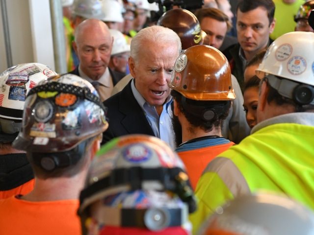 Democratic presidential candidate Joe Biden meets workers and discusses gun rights as he tours the Fiat Chrysler plant in Detroit, Michigan on March 10, 2020. - Biden opened primary day meeting workers at an under-construction automobile plant in Detroit, where he received cheers but also was confronted by one worker. …
