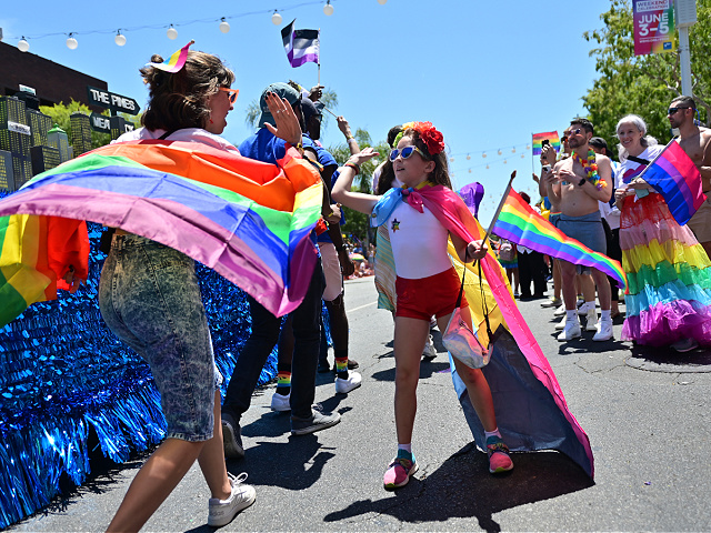WEST HOLLYWOOD, CALIFORNIA - JUNE 05: A young attendee watches the city of West Hollywood's Pride Parade on June 05, 2022 in West Hollywood, California. (Photo by Sarah Morris/Getty Images)
