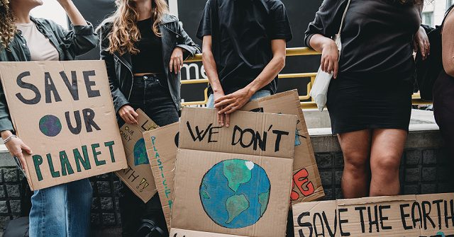 Watch climate change protesters block traffic, police arrest parole begging to come to work