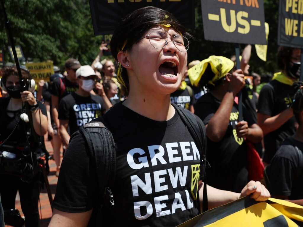 WASHINGTON, DC - JUNE 28: Hundreds of young climate activists rally in Lafayette Square on the north side of the White House to demand that U.S. President Joe Biden work to make the Green New Deal into law on June 28, 2021 in Washington, DC. Organized by the Sunrise Movement, the 'No Climate, No Deal' marchers demanded a meeting with Biden to insist on an 'infrastructure package that truly invests in job creation and acts to combat the climate crisis.' (Photo by Chip Somodevilla/Getty Images)