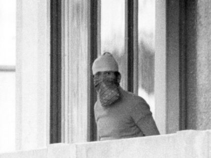 A masked Arab terrorist shows himself on the balcony of the Israeli team's accomodation in the Olympic Village on the 5th of September in 1972. Arabic terrorists of the group "Black September" had entered the village in the morning of the 5th of September in 1972, overwhelmed nine athletes and …