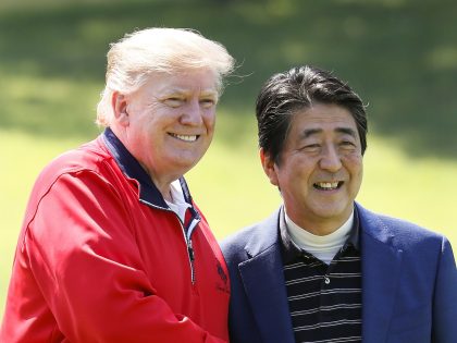U.S. President Donald Trump, left, and Shinzo Abe, Japan's prime minister, pose for photographs at Mobara Country Club in Mobara, Chiba Prefecture, Japan, on Sunday, May 26, 2019. Trump woke early in Tokyo to say he would ask for an "expedited appeal" against a California judge's ruling late Friday that …