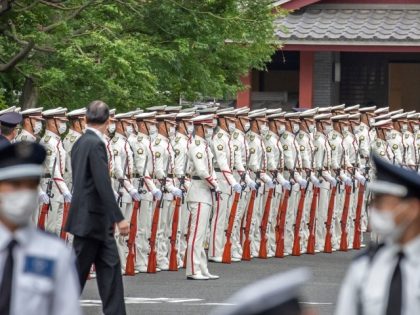 TOKYO, JAPAN - JULY 12: Japan Ground Self-Defense Force honor guard members line up at Zojoji temple where the funeral for Japan's former prime minister Shinzo Abe is held on July 12, 2022 in Tokyo, Japan. Abe was assassinated as he was campaigning at a rally in Nara on Friday. …
