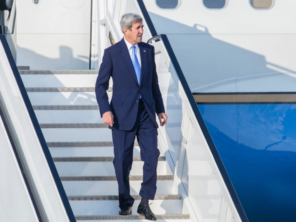 US Secretary of State John Kerry disembarks from a plane upon arriving on October 13, 2016 at Kigali International Airport, where he is expected to attend the 28th Meeting of the Parties to the Montreal Protocol. Envoys from nearly 200 nations are in the Rwandan capital to thrash out an agreement to phase out hydrofluorocarbons (HFCs). Halting the use of HFCs also found in aerosols and foam insulation is crucial to meeting the goals to curb the rise of global temperatures agreed in a historic accord signed in Paris last year. / AFP / CYRIL NDEGEYA (Photo credit should read CYRIL NDEGEYA/AFP via Getty Images)