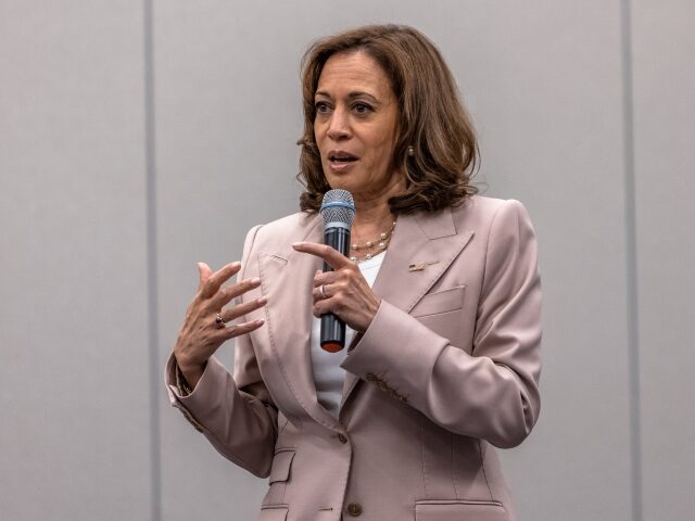 US Vice President Kamala Harris speaks while visiting members of Omega Psi Phi Fraternity