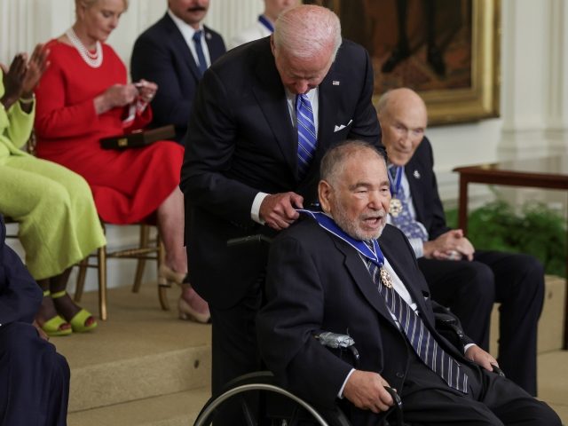 WASHINGTON, DC - JULY 7: U.S. President Joe Biden presents the Presidential Medal of Freedom to Raul Yzaguirre, civil rights advocate who served as president of the National Council of La Raza for 30 years, during a ceremony in the East Room of the White House July 7, 2022 in …