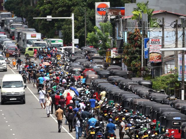 Drivers are waiting in long queues at an Indian Oil Corporation (IOC) filling station in Colombo, Sri Lanka on July 02, 2022. (Photo by Pradeep Dambarage/NurPhoto via Getty Images)